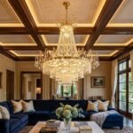 Sophisticated integrated linear LED channel lighting and discreet spotlights in an architectural living room ceiling, highlighting a modern approach to best ceiling lights for living room design.