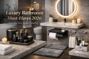 Luxury bathroom decor must haves 2026 featuring modern black and gold accessories LED mirror and spa style bathroom setup